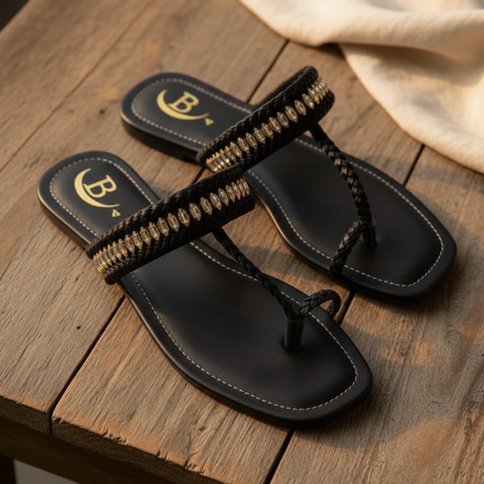 Handcrafted sandals that blend comfort and timeless elegance. Braided detailing with a hint of shimmer for a sophisticated touch. Perfect for everyday or festive wear.(B71)